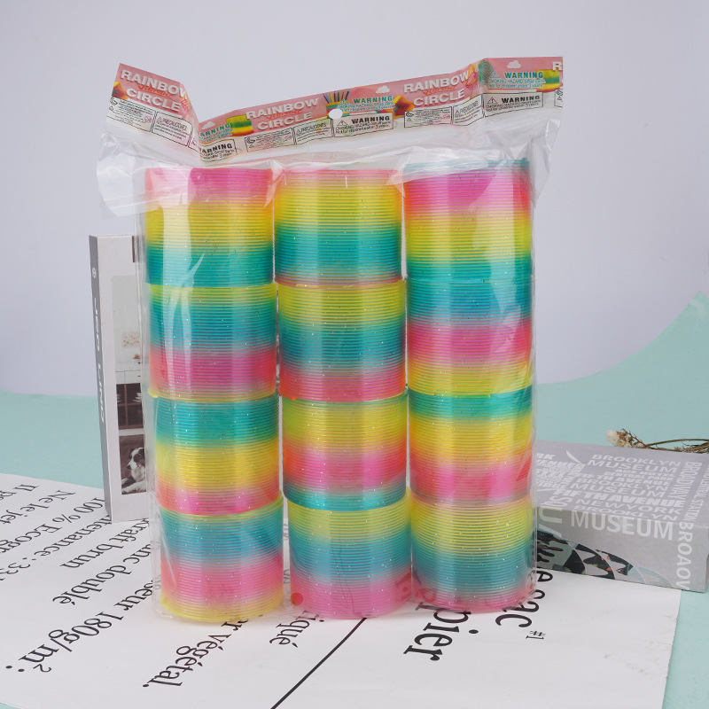Stall prizes around the school hot selling small toy spring circle puzzle small Bag Magic Rainbow Circle wholesale