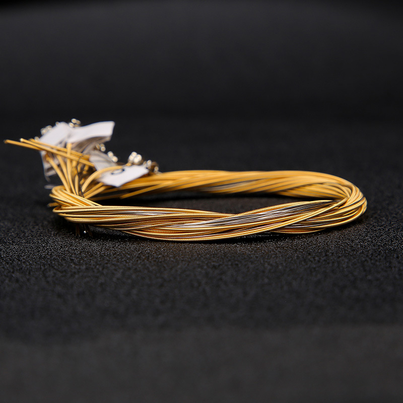 Enter the new Lea piano single string packaging 7/10/16/19/21/24/27/32 full series of brass strings