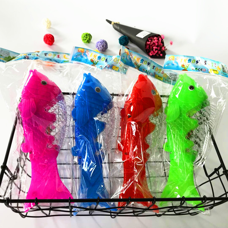 Children's electric fish projection electric solid color fish with light music swing fish stall toys wholesale