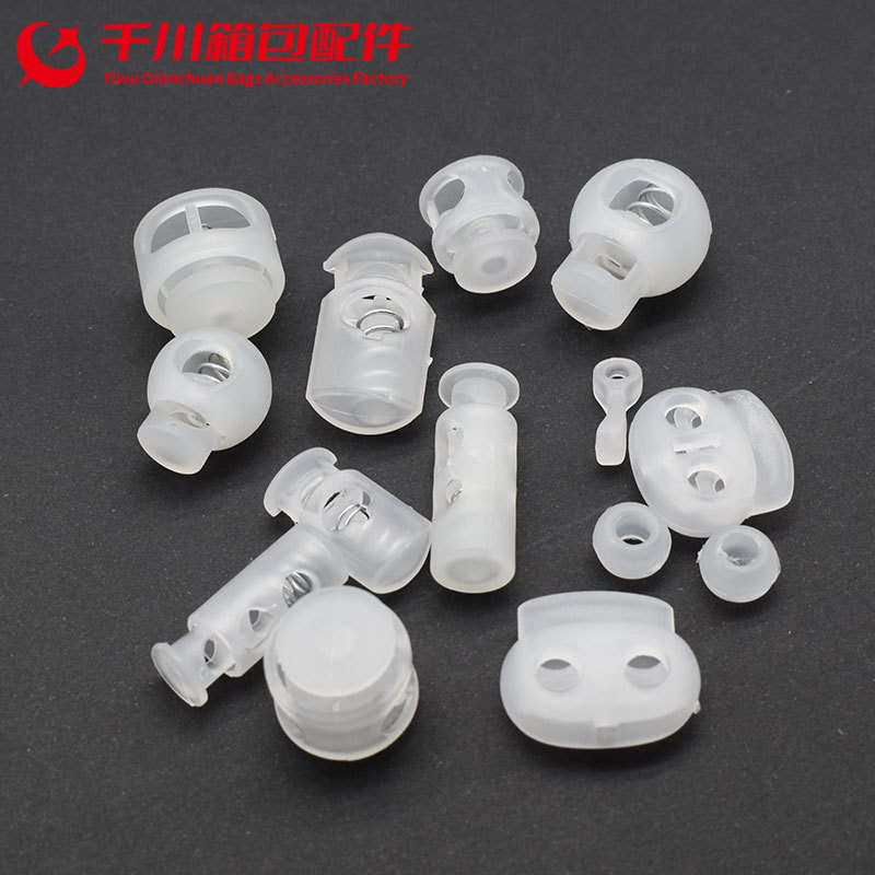 Plastic button transparent spring buckle elastic adjustment button stop rope buckle pig nose buckle down jacket button hanging clock rope buckle