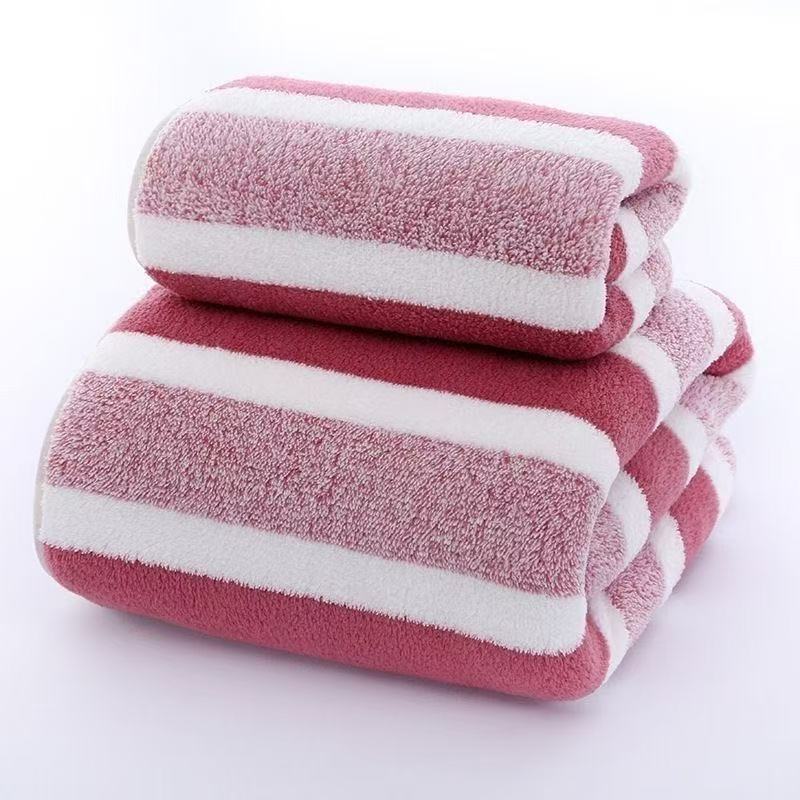 Wholesale warp knitted striped coral fleece bath towel 70*140 thick absorbent lint free gift wholesale household bath towel