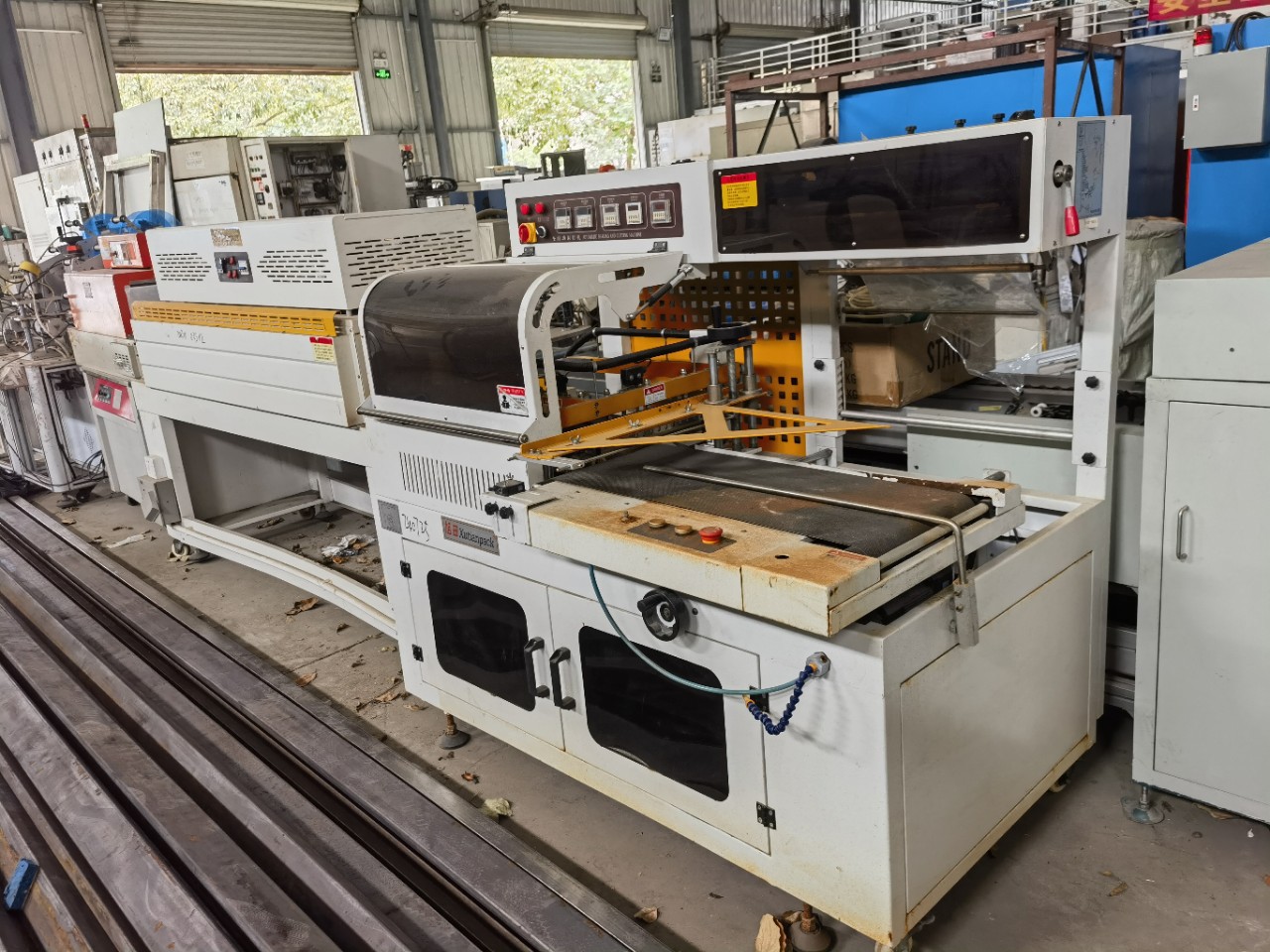 Processing Fully Automatic Heat Shrinking Machine, Film Sealing and Cutting Machine, L-Type Fully Automatic Sealing and Cutting Machine, Pof Shrink Film Type 450