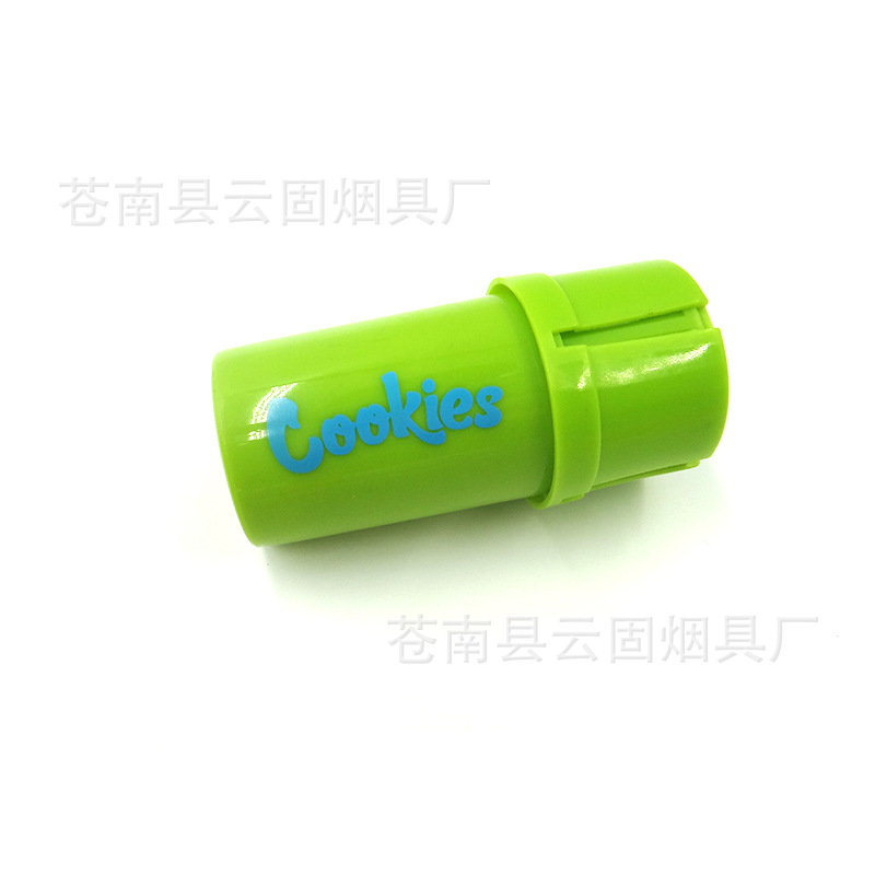 Factory wholesale hot selling cookies colorful plastic bottle shape cigarette grinder waterproof bottle sealed tobacco storage tank