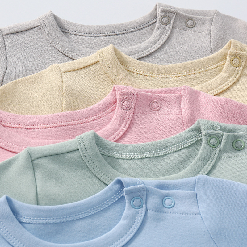 Spring and autumn baby pure color shoulder buckle long-sleeved romper men's and women's baby cotton one-piece long-leg romper factory direct sales