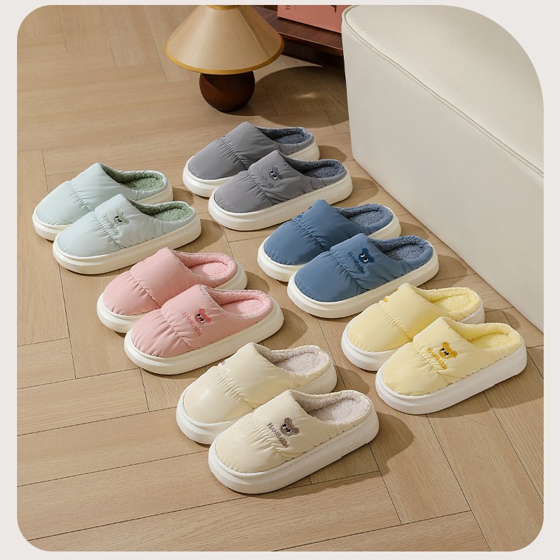 Down cloth waterproof cotton slippers women's new home mute thick-soled winter couples cotton slippers men wholesale outro