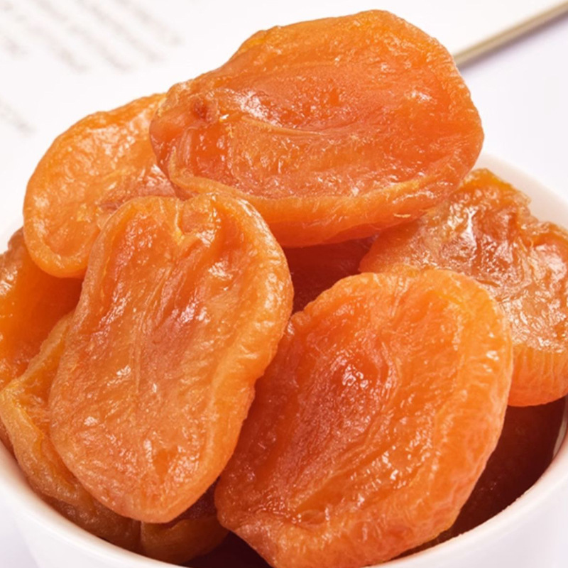 Candied snacks wholesale coreless red apricot dried preserved fruit sweet and sour soft glutinous leisure snacks support one-piece delivery golden dried apricot