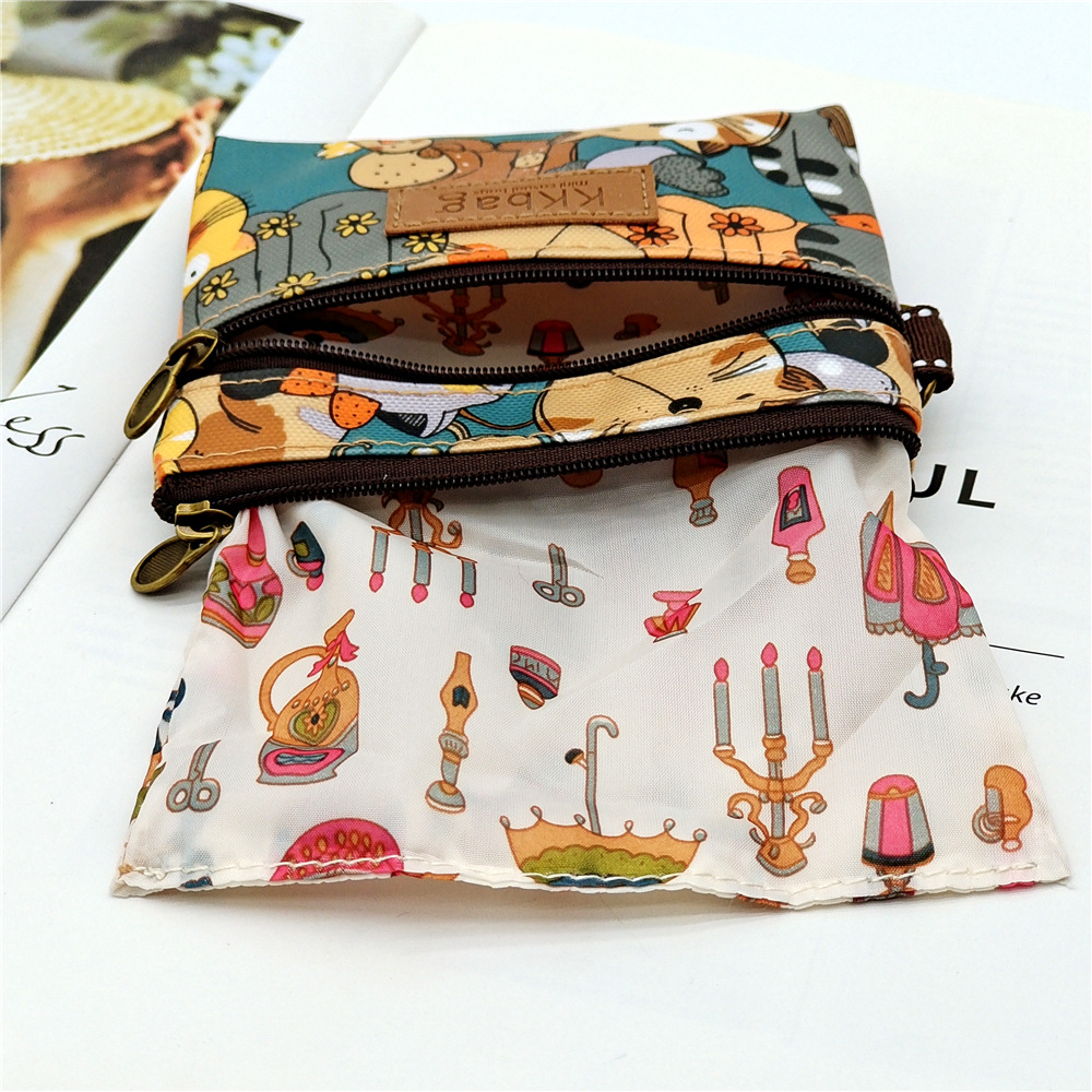 2023 New Printed Film Cartoon Coin Purse Anti-fouling Waterproof Lipstick Coin Storage Bag Women's Bag
