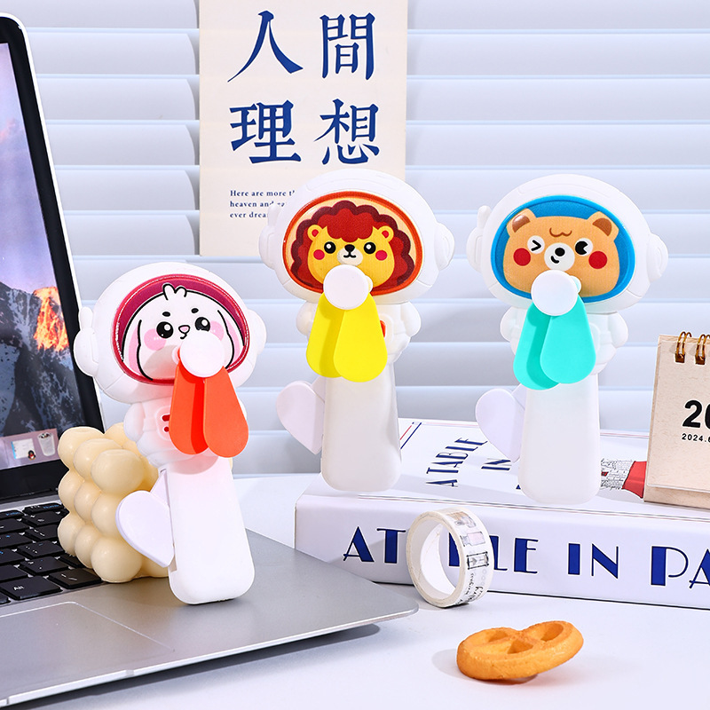 Children's cartoon hand pressure fan creative animal donut mini manual hand crank small fan school gifts wholesale
