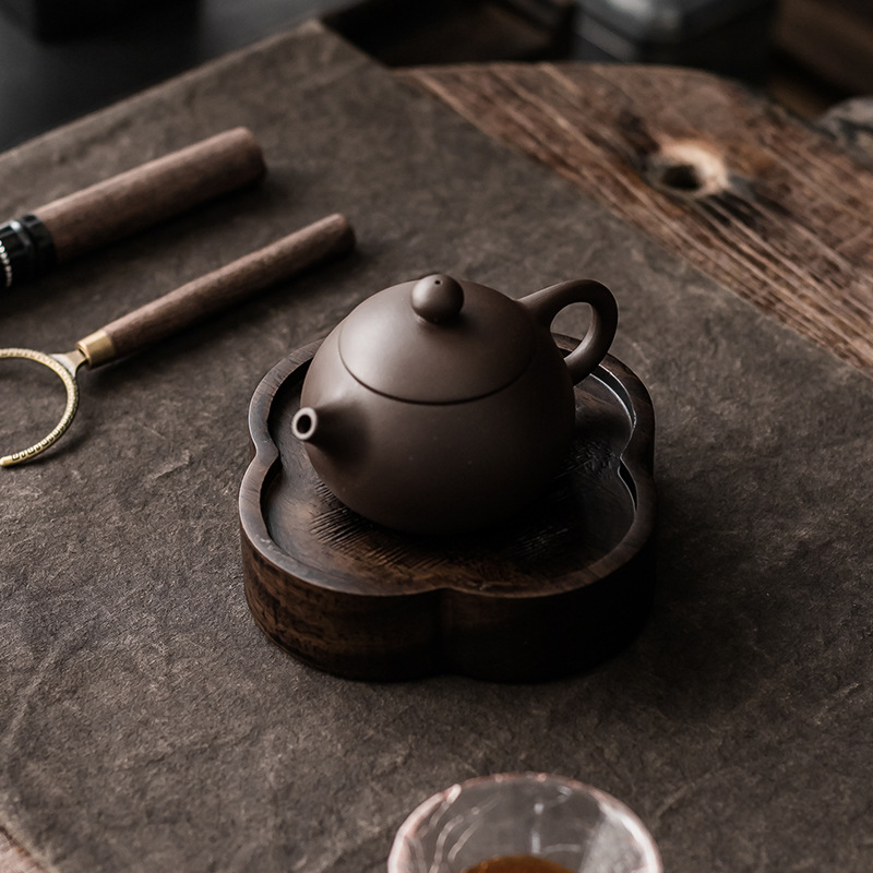 Factory wholesale Ebony whole wooden pot bearing dry bubble table small tea table solid wood pot bearing teapot supporting pot mat tea tray