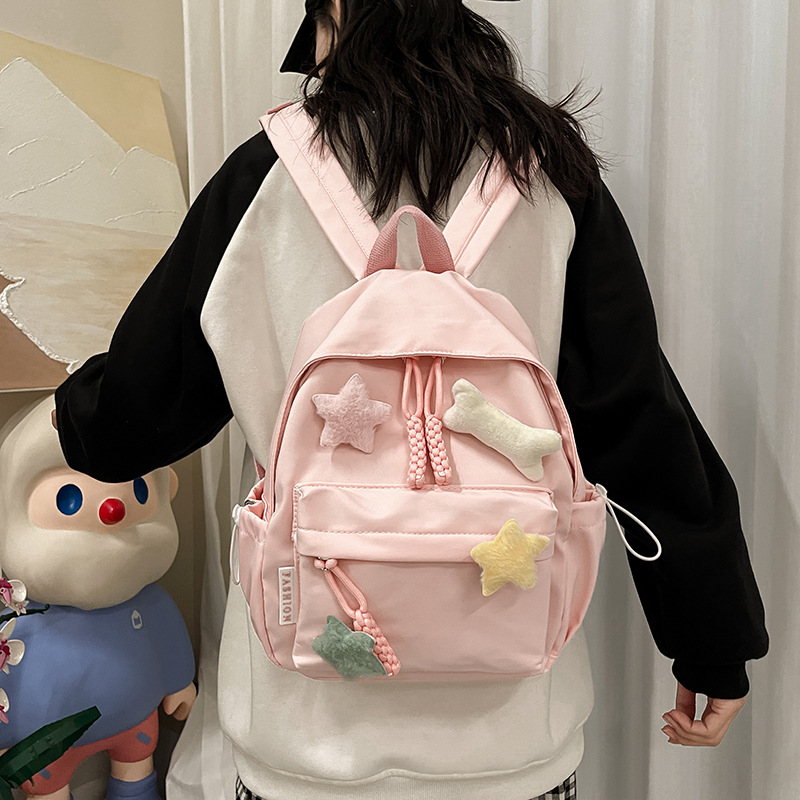 Schoolbag female middle school student college student simple all-match cute five-pointed star bone backpack female Fresh