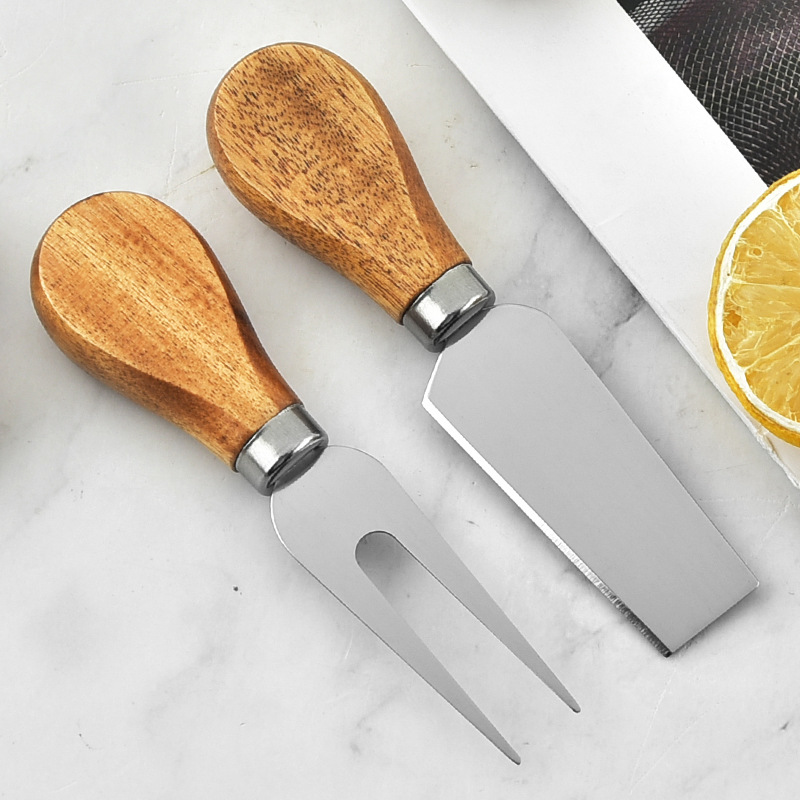 Factory in stock cheese knife 4-piece stainless steel butter knife pizza knife oak handle cheese cheese knife and fork