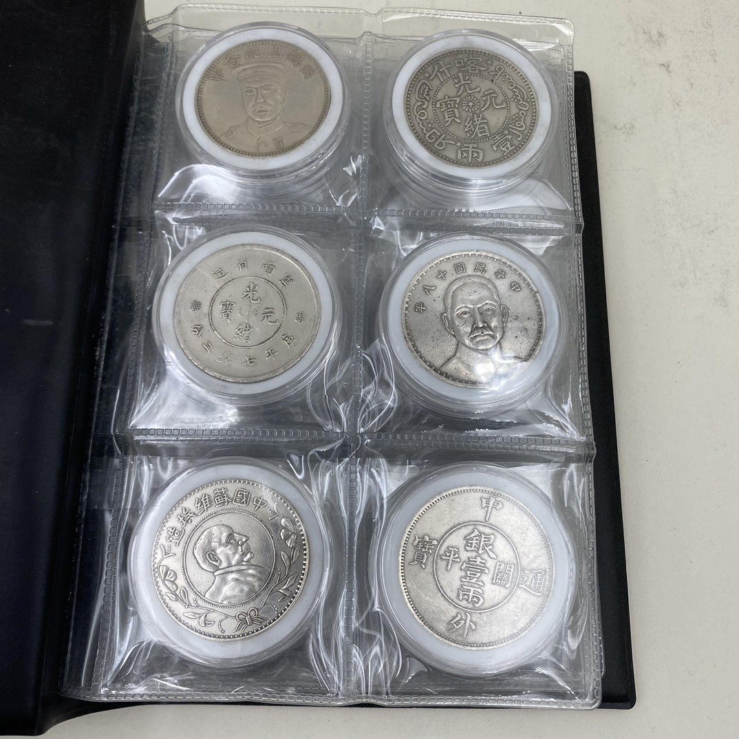 A Set of Anti-Ancient Coins, a Set of 36 Silver Dollar Collections, a Complete Set of Commemorative Coins, a Collection of Grade Coins, a Set of Brass Collection Books