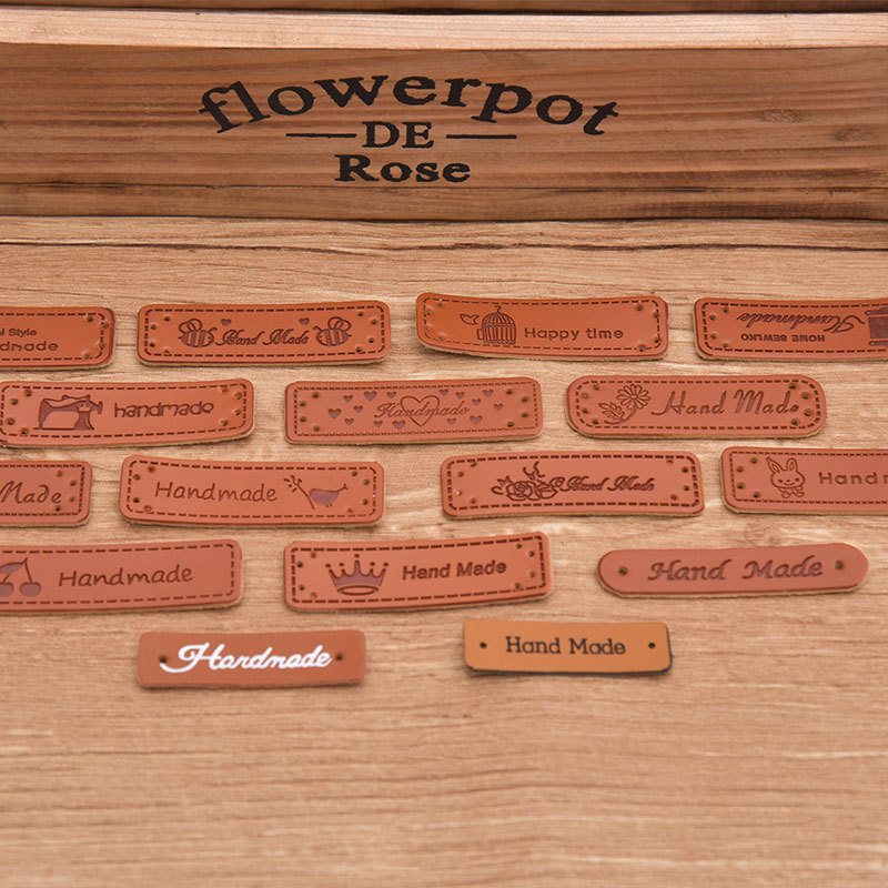 Wholesale PU leather label color-changing leather clothing accessories woven label logo handmade leather brand printing manufacturers