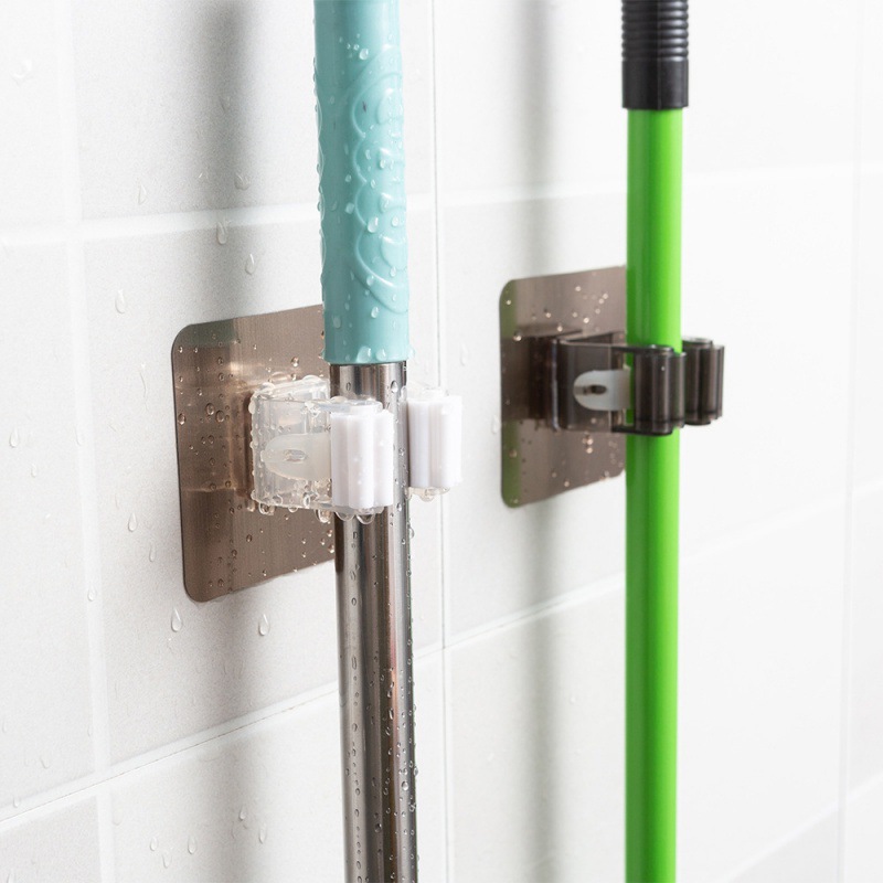 Mop rack punch-free strong mop clip hook wall-mounted mop buckle holder rack seamless stickers wholesale