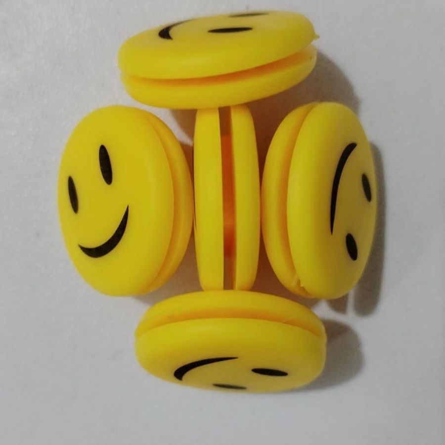 Tennis racket shock absorber smiley face tennis racket shock absorber firm cute personality PVC silicone shock absorber wholesale