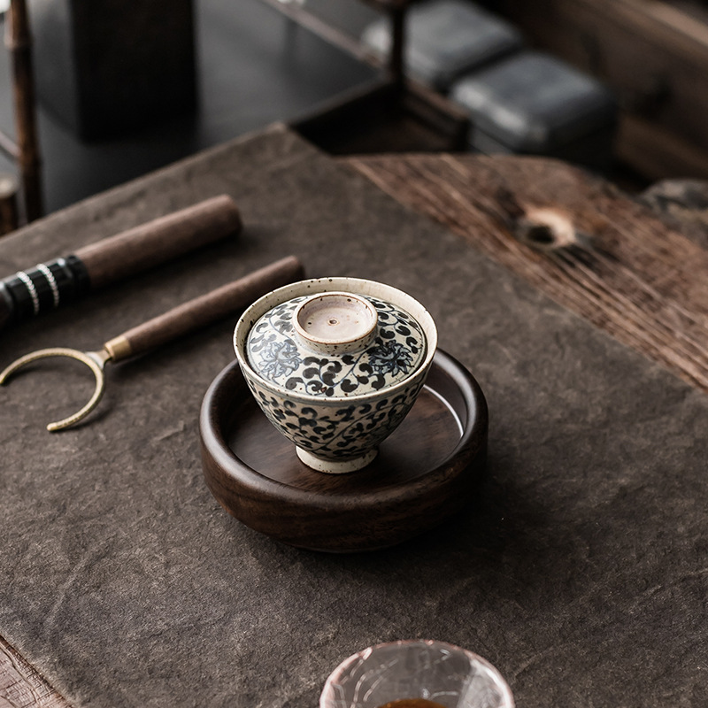 Factory wholesale Ebony whole wooden pot bearing dry bubble table small tea table solid wood pot bearing teapot supporting pot mat tea tray