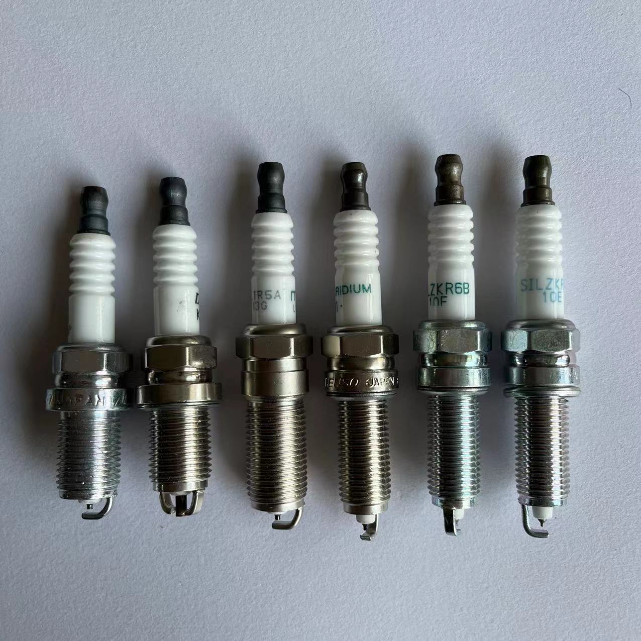 Automobile spark plug BKR6EGP auto parts double gold NGK spark plug 7092 car van fire nozzle