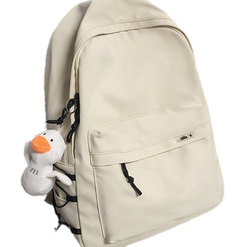 Backpack men's simple large capacity travel backpack women's casual Japanese junior high school student schoolbag men