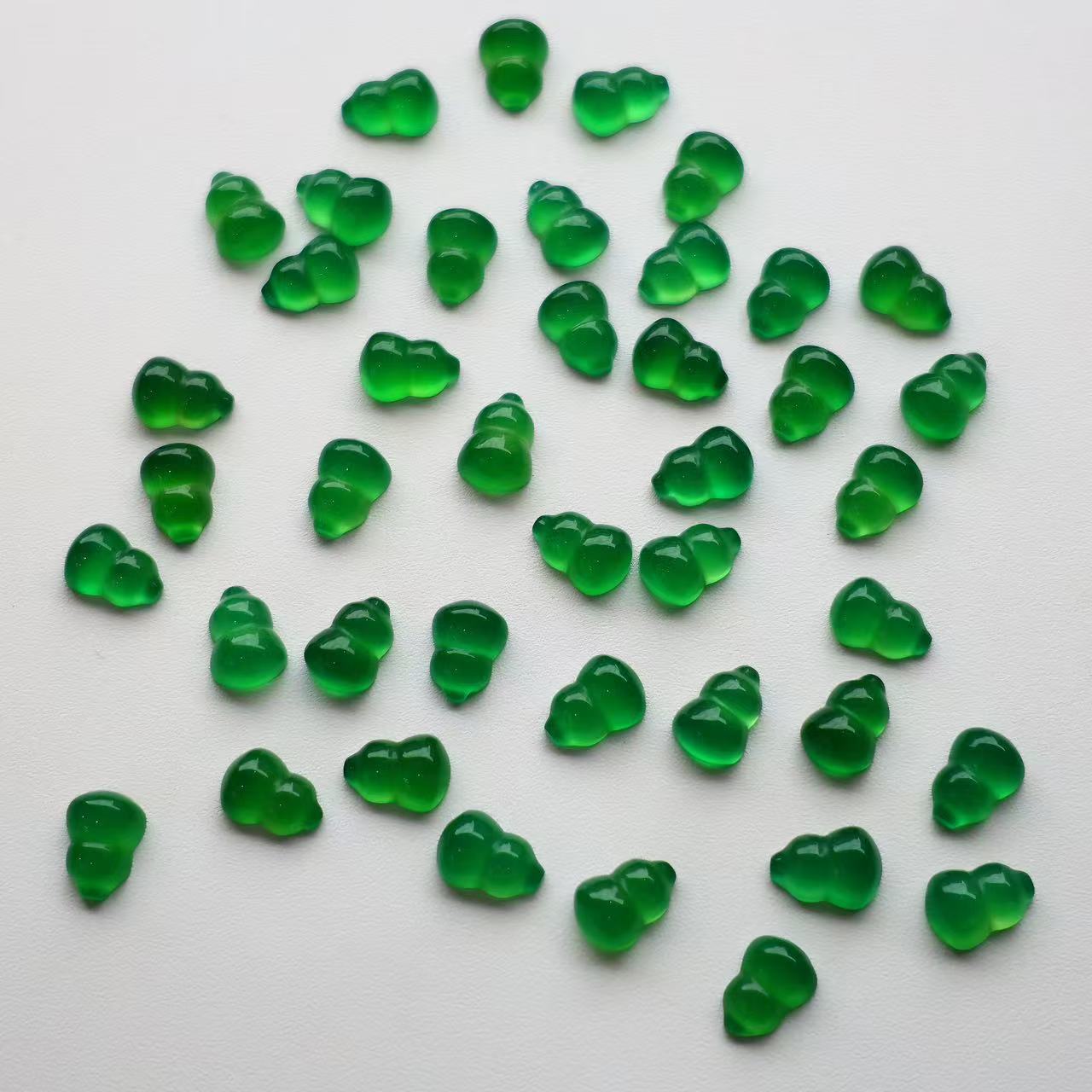 Natural green chalcedony flat bottom 7*9 gourd bracelet pendant bare stone carving craft accessories jewelry wholesale processing