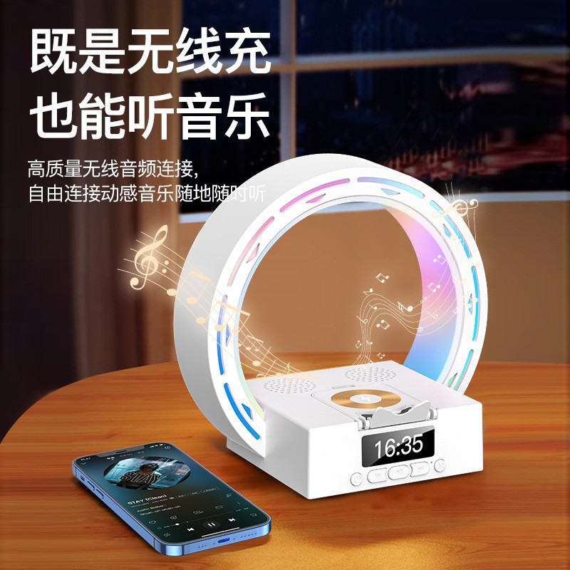 Multifunctional round speaker wireless fast charging mobile phone stand time digital display Bluetooth audio