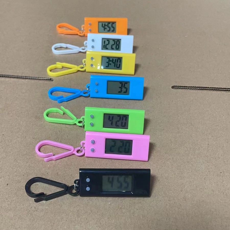 Small Wholesale Student Keychain Watch Promotion Taobao Gift Backpack Elliptical Electronic Watch Hanging Watch Hanging Watch