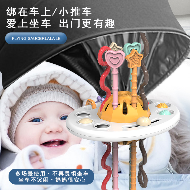 New children's finger pull fun press grip exercise baby baby flying saucer smoke toy
