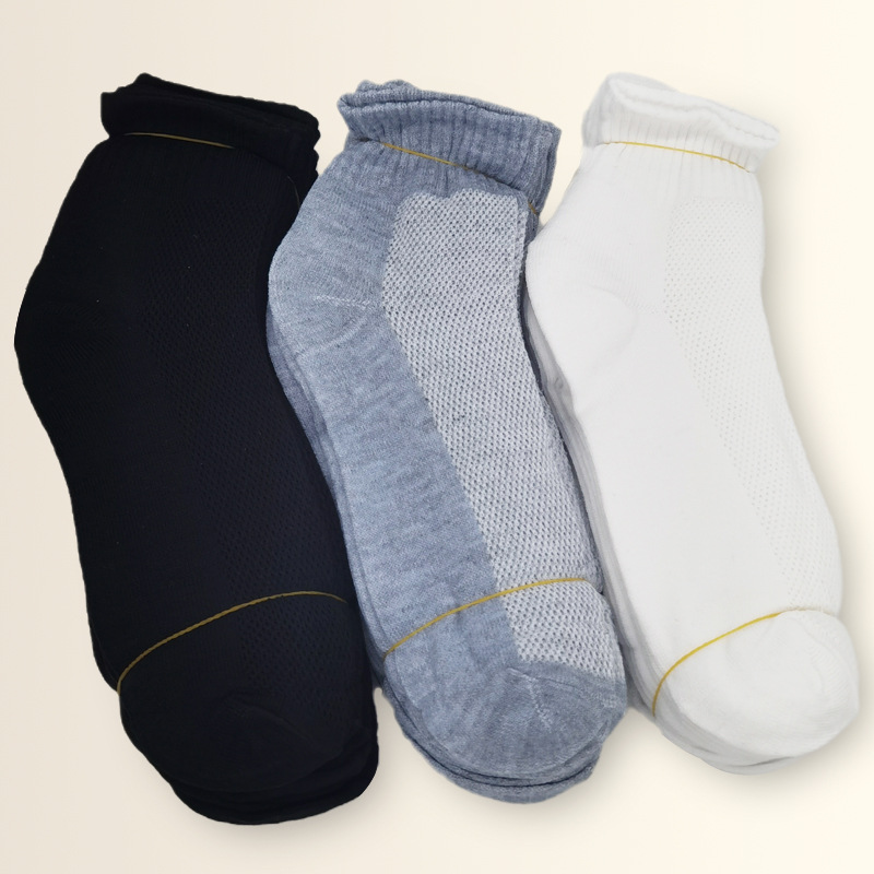 Socks men's mid-calf sports casual black white gray business solid color mesh disposable cheap socks stall wholesale