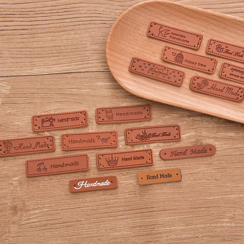 Wholesale PU leather label color-changing leather clothing accessories woven label logo handmade leather brand printing manufacturers