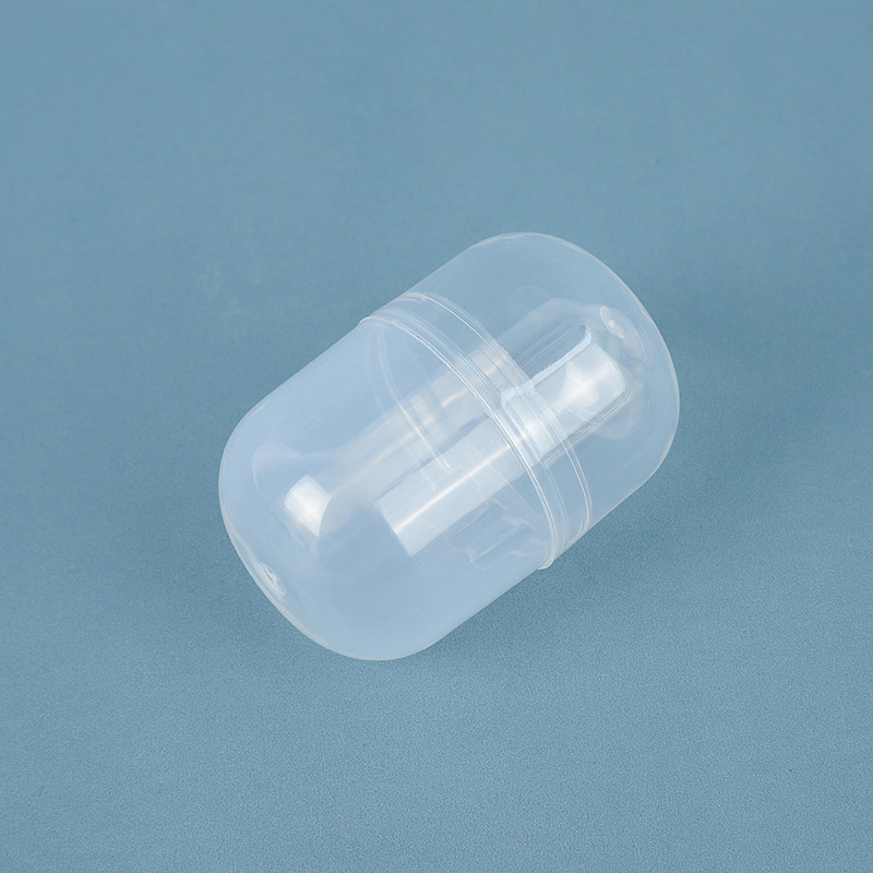 32x 47mm conjoined capsule twisted egg shell oval transparent twisted egg ball one yuan twisted egg machine gift ball blind box wholesale