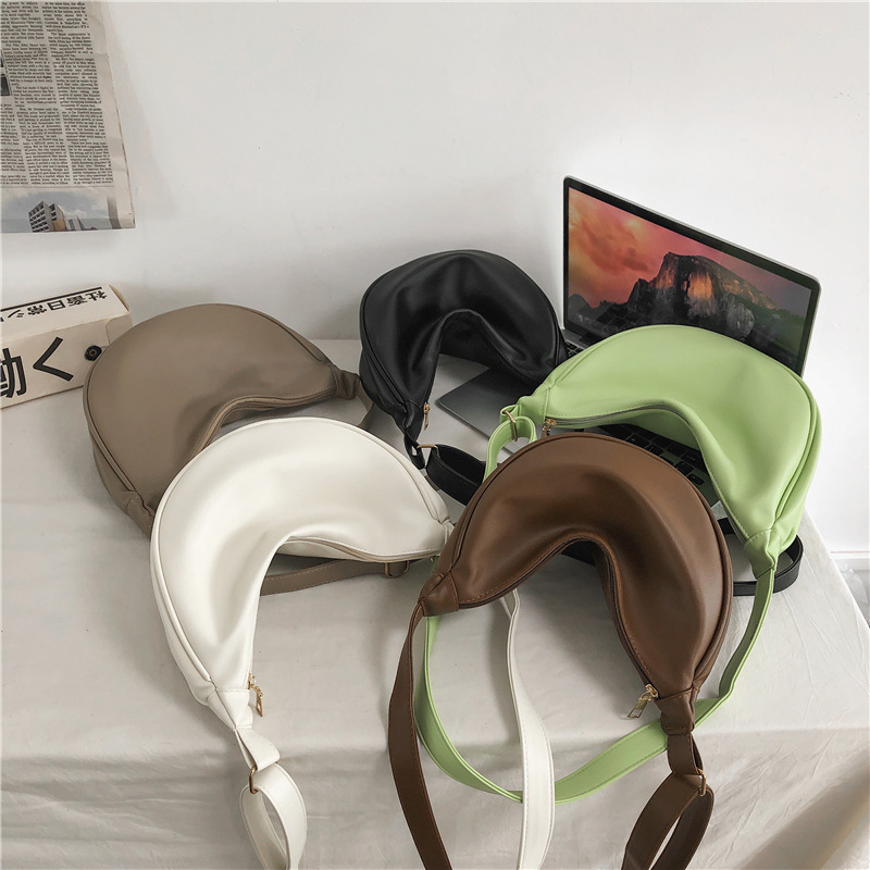 Korean ins bag mini messenger bag men and women design the same pu texture dumpling bag cos bag a generation of hair