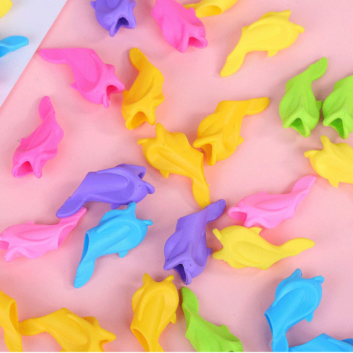 Silicone small fish pen holder student writing pencil set children's small dolphin pen writing corrector manufacturers wholesale