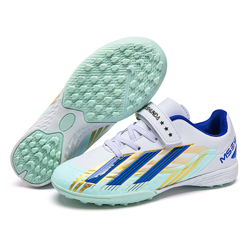 Factory direct selling children's football shoes tf broken nails artificial lawn boys and girls students leather feet students training sneakers