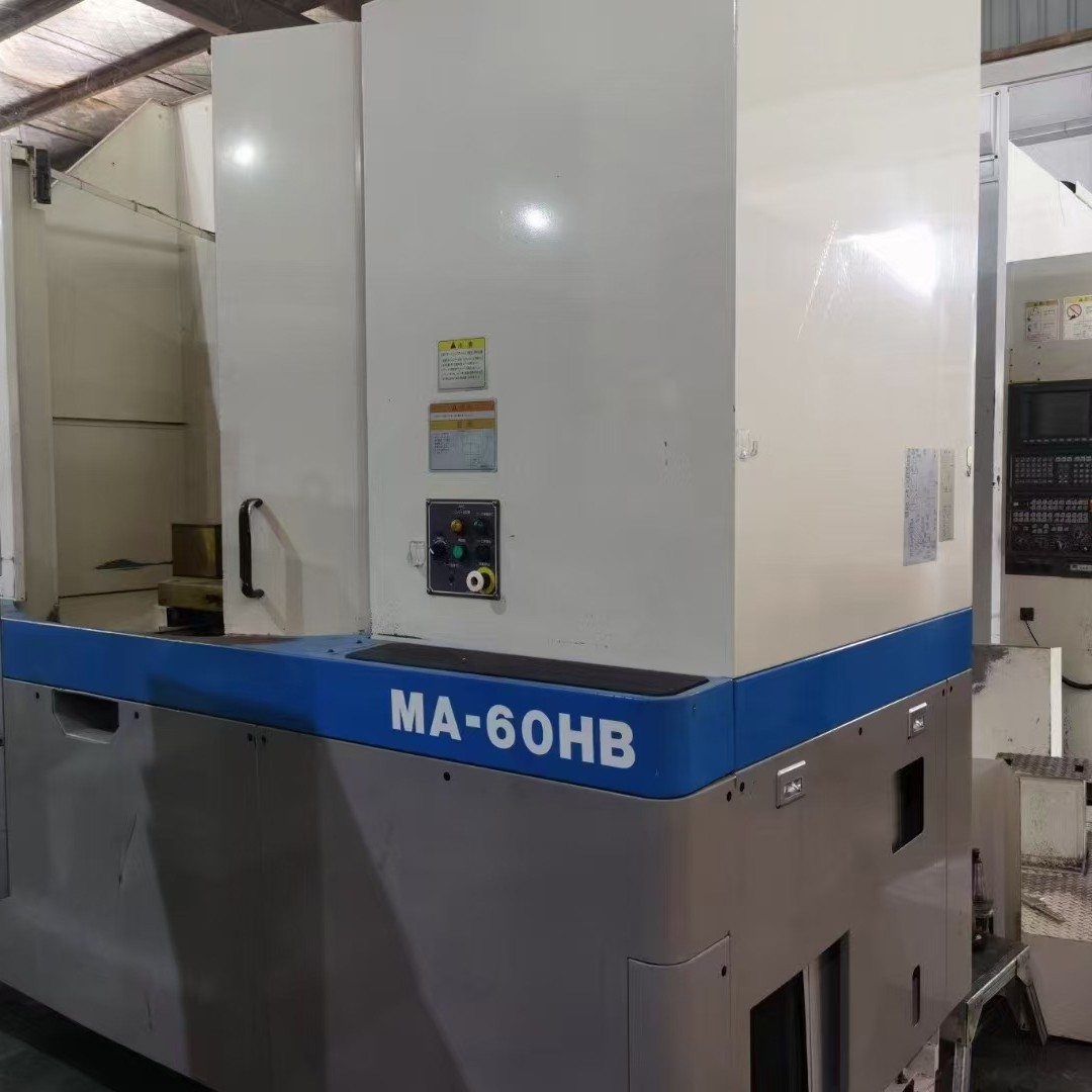 Продается б/у шпиндель для горизонтального обрабатывающего центра Okuma MA-600HB, конус BT50, магазин инструментов: 40